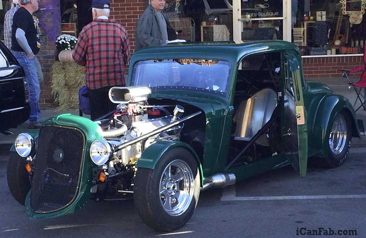plymouth coupe at the car show
